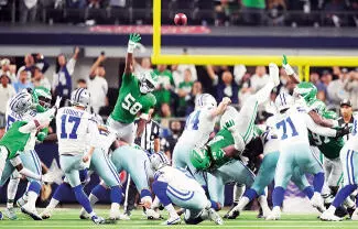 Los Dallas Cowboys (5-5-1) se levantaron de una losa de 21 puntos por cuarta vez en su historia