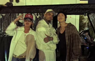 RM y J-Hope fueron captados en el show de Chris Brown y Usher en Toronto, desatando críticas de fans por el historial de violencia del cantante.